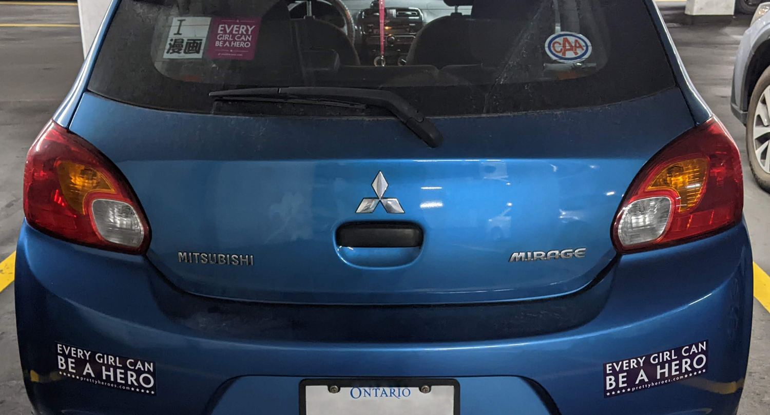 Blue Car with Bumper Stickers