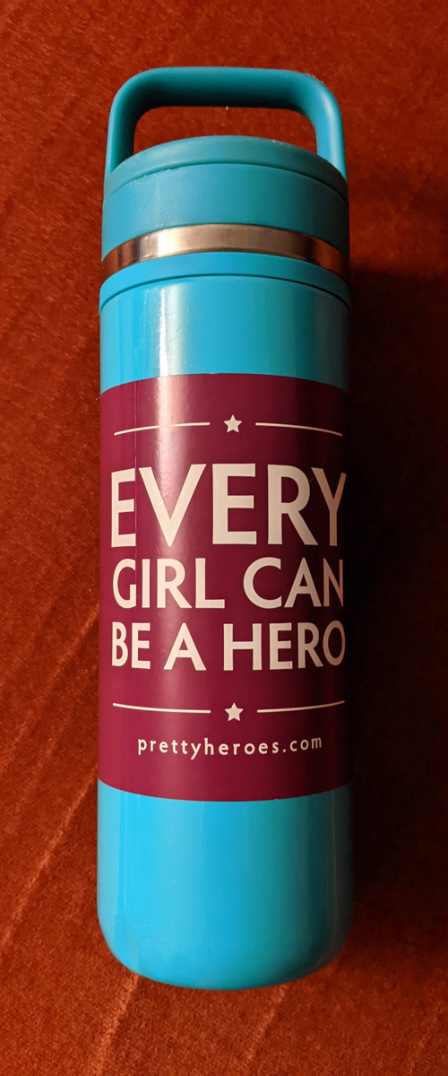 Every Girl Can Be a Hero Sticker Affixed to a Thermos